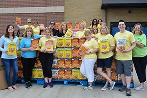 CHM employees with cereal