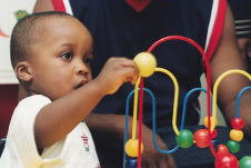 Child playing with toy