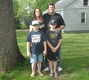 hunter family standing under tree