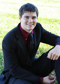 teen boy in black suit