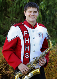 teen boy in marching band uniform with saxophone