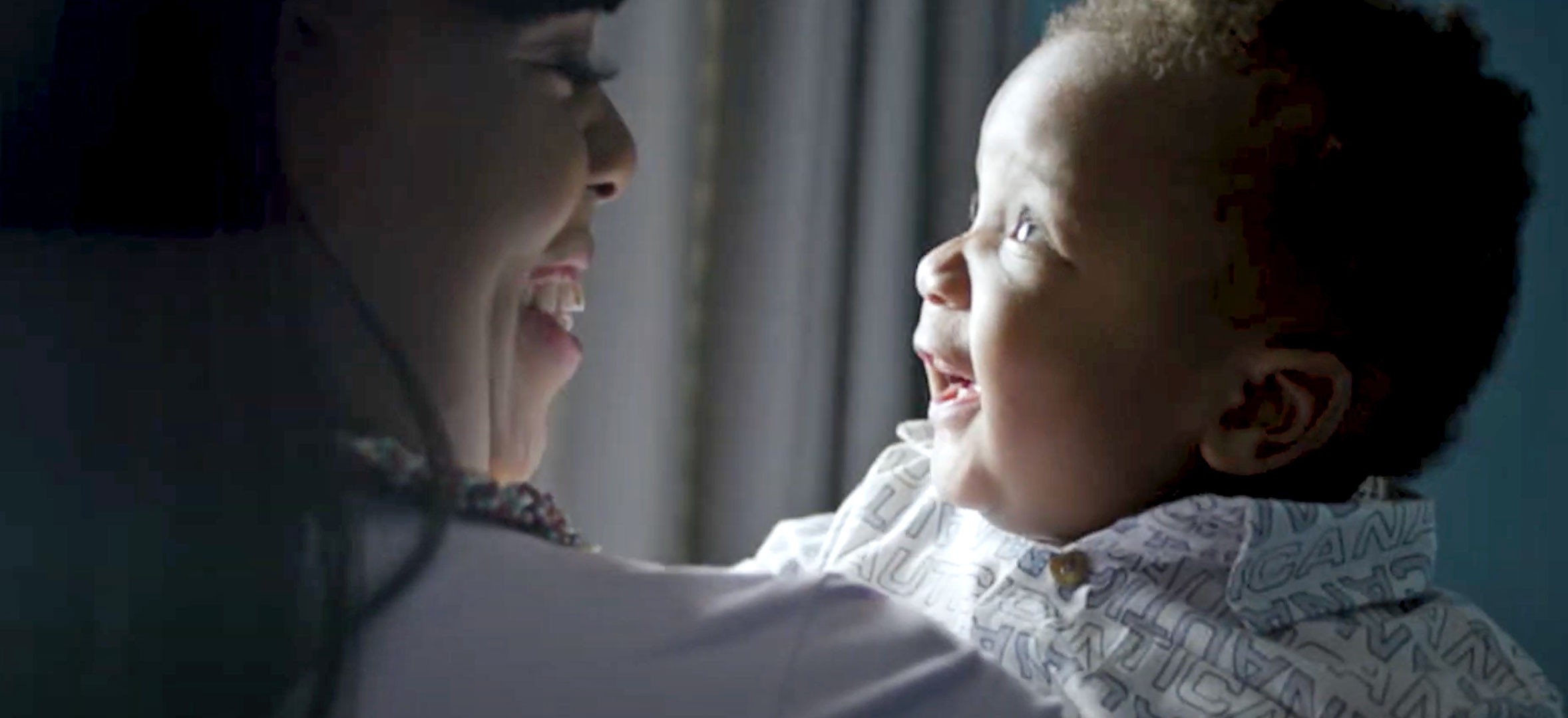 Smiling Mother and Baby